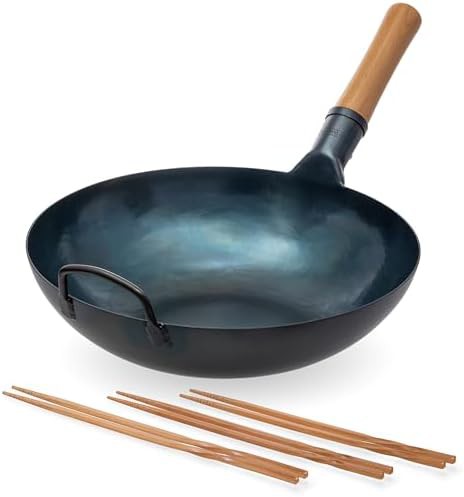 Blue flat bottom wok with wooden sticks